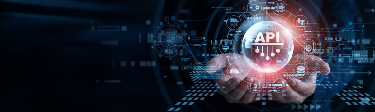 Software developer. Human hands holding API glowing global globe connecting application servers smoothly. Engineering team building integrated database web interfaces for systems.