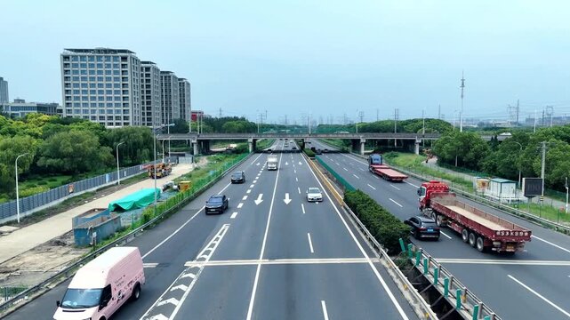 Static Aerial View of Trucks, Bus and Cars on a Shanghai Highway