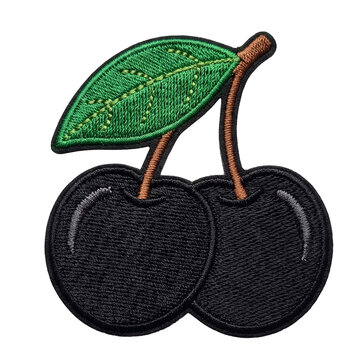 Two black cherries with green leaf embroidered patch badge isolated background