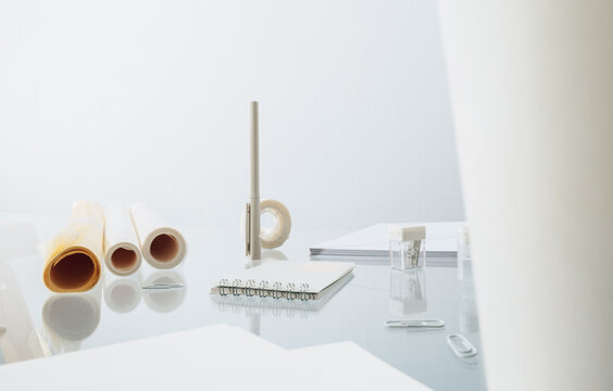 Scattered items on office desk 