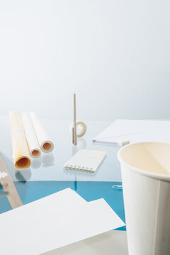 Scattered items on office desk 