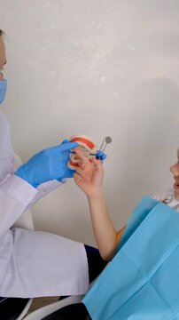 A child at the dentist gets his teeth treated. Selective focus.