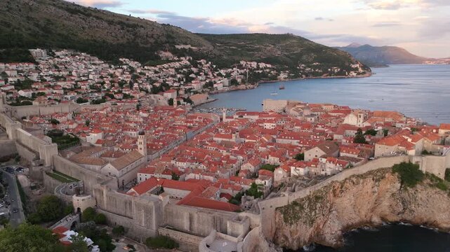 Dubrovnik old town aerial above the walls with the bay behind