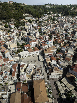 Aerial view of Solomos Square and the surrounding urban landscape of Zakynthos town, featuring historic buildings, terracotta rooftops, and narrow streets, Zakinthos, Greece.