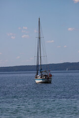 Sailing ship at sea under a blue sky © Anja