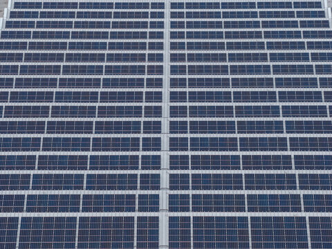 Aerial view of solar panels on the roof of the Poly-clip System GmbH Co. KG facility in Hattersheim am Main, Hessen, Germany.