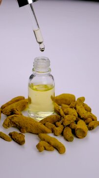Turmeric root for supplements and essential oils. Selective focus.