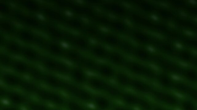 Dark green abstract background featuring a soft diagonal grid of blurry light spots for design use
