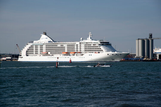 Southampton England UK. 03.08.2026. The cruise ship Seven Seas Voyager sailing down Southampton Water towards the open sea.