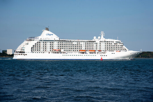 Southampton England UK. 03.08.2026. The cruise ship Seven Seas Voyager sailing down Southampton Water towards the open sea.