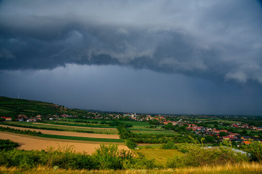 Stormy sky with dramatic clouds from an approaching thunderstorm at sunset