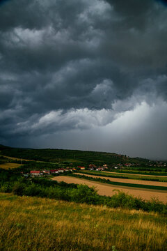 Stormy sky with dramatic clouds from an approaching thunderstorm at sunset