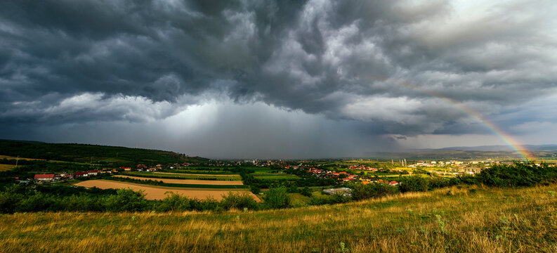 Stormy sky with dramatic clouds from an approaching thunderstorm at sunset