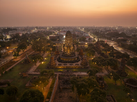 Aerial view of Wat Ratchaburana at sunset, featuring the ancient prang surrounded by historic ruins in Amphoe Phra Nakhon Si Ayutthaya, Chang Wat Phra Nakhon, Thailand.