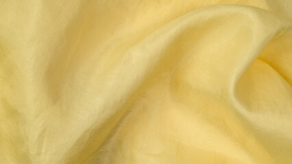 diagonal waves of yellow silky cloth