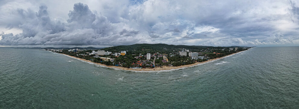 Aerial view of Long Beach featuring coastal hotels, lush tropical vegetation, and sandy shores in Phu Quoc, Kien Giang, Vietnam.
