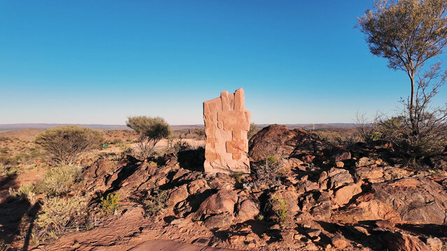Broken Hill, Australia - 11 December 2024: View of the Living Desert Sculptures standing on a rocky hill in the arid outback landscape under a clear blue sky.