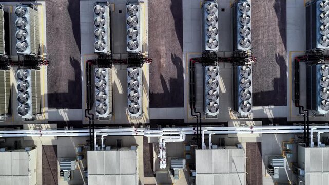 Aerial view of cooling fans at the Eagle Mountain Meta Data Center, showing industrial infrastructure, piping, and mechanical units in Eagle Mountain, Utah, United States.