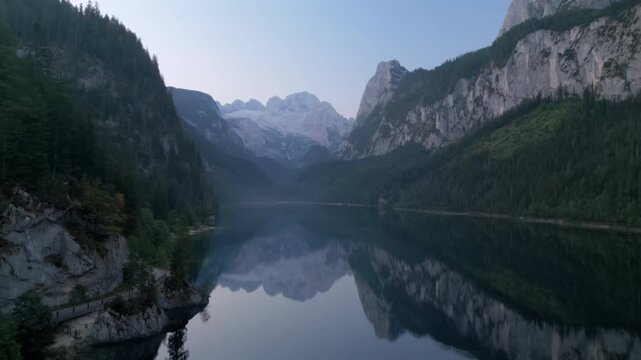Aerial View of Vorderer Gosausee Mountain Lake with Morning Mist and Mountain Reflections, Gosau, Austria.