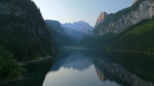 Aerial View of Vorderer Gosausee Mountain Lake with Morning Mist and Mountain Reflections, Gosau, Austria.