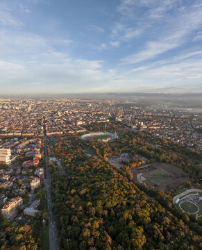 Aerial view of Vasil Levski National Stadium surrounded by lush parkland and the urban cityscape of Sofia, Sofia City Province, Bulgaria.