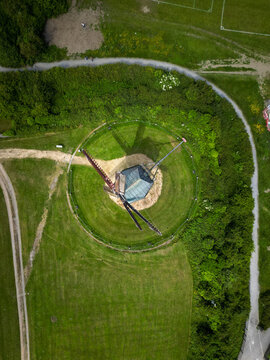 Aerial view of the historic Skerries Mills windmill surrounded by lush green fields and walking paths in Skerries, County Dublin, Ireland.