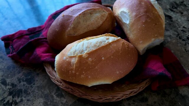 Mexican bolillo bread freshly baked in a basket for breakfast or dinner