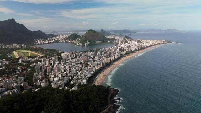 Aerial view of the Rio de Janeiro coastline, featuring the urban skyline, sandy beaches, and surrounding mountains in Rio de Janeiro, State of Rio de Janeiro, Brazil.