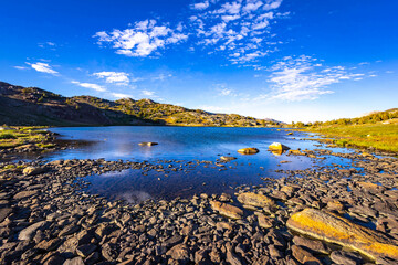 Rocky Shore of Upper Gaylor Lake at Yosemite Sunset © PhotoSpirit