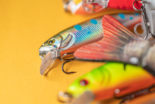 Extreme close up of a holographic fishing lure with blue spots The Concept of realistic bait and design