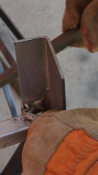 Filing Rough Metal Edge of Iron Sheet with Hand File
