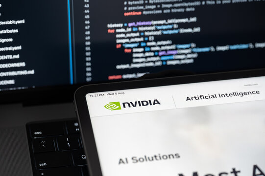 NVIDIA Ai company web page on program code background