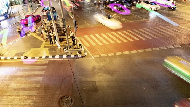 traffic in central bangkok with code and data overlayed in the buildings 