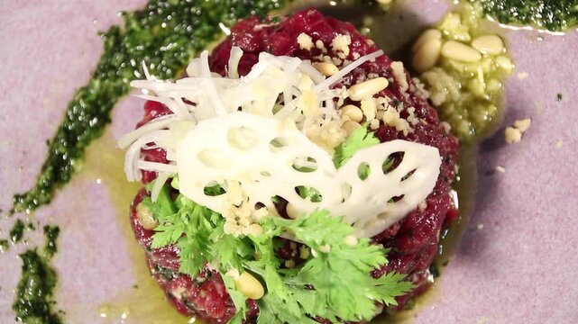 Korea raw beef yukhoe beef tartare seasoned raw beef with lotus root pine nuts sesame oil traditional korean food dish meal cuisine Korea 한국 소고기 육회 생고기 한우 연근 잣 참기름 양념육회 우둔살 한식 식재료 전통음식 대표요리