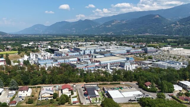Crolles, France &ndash; 1 August 2026: Aerial panoramic view of the STMicroelectronics semiconductor manufacturing complex surrounded by the French Alps, a major European site for microchip and silicon wafe
