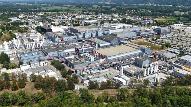 Crolles, France &ndash; 1 August 2026: Aerial panoramic view of the STMicroelectronics semiconductor manufacturing complex surrounded by the French Alps, a major European site for microchip and silicon wafe