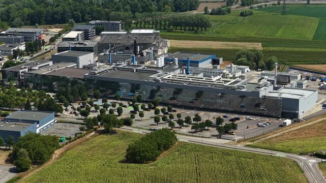 Bernin, France - August 1, 2026: Wide aerial view of Soitec semiconductor manufacturing complex producing advanced silicon wafers and materials for the global microelectronics industry