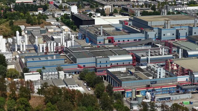Crolles, France &ndash; 1 August 2026: Aerial close-up of industrial gas storage and utility infrastructure at the STMicroelectronics semiconductor manufacturing plant, supporting silicon wafer and chip pro