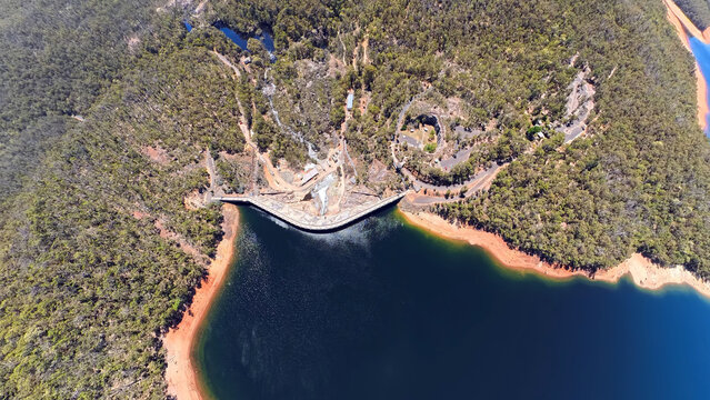 Worsley, Australia - 05 January 2026: Aerial view of Wellington Dam surrounded by dense eucalyptus forest and rugged terrain in Western Australia.