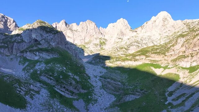 Albanian alps Jezerca lakes morning light in clear sky