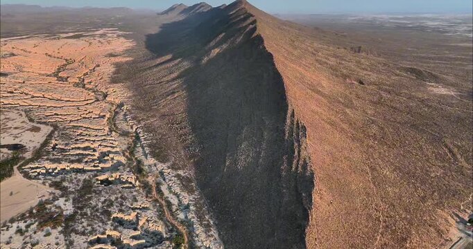 Aerial view of the rugged mountain ridge and desert landscape in Parras de la Fuente, Coahuila, Mexico.