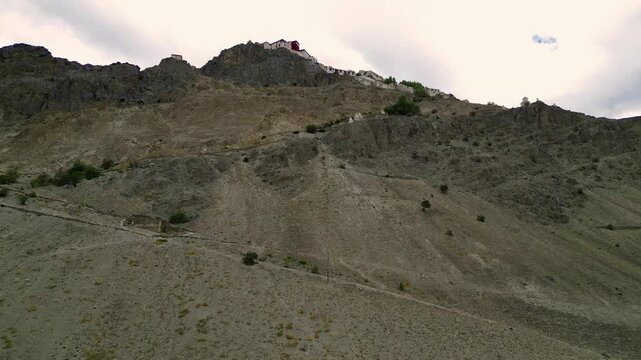 Aerial view of rugged mountain slopes and arid terrain in the Zanskar valley, Zanskar, Ladakh, India.