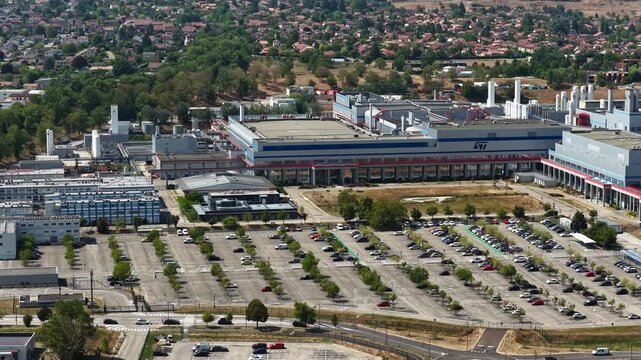 Crolles, France &ndash;  1 August 2026: Aerial panoramic view of the STMicroelectronics semiconductor manufacturing complex, a major European site for microchips, integrated circuits and silicon wafer produ