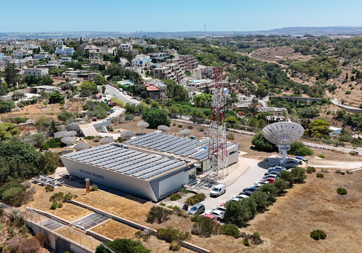 Aerial view of Melita ground station in Malta with towers and dishes onsite