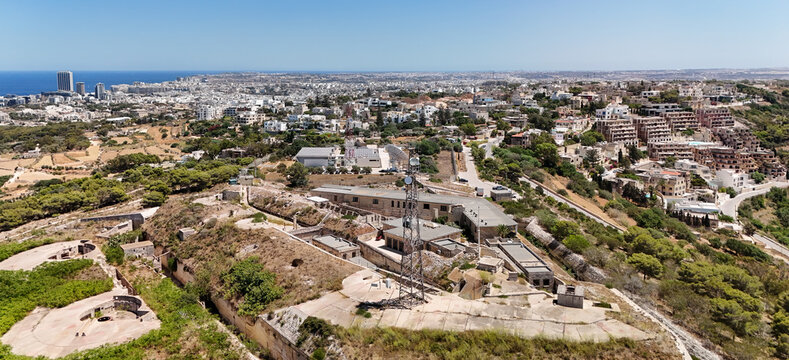 Aerial view of Fort Madliena, Malta with radar towers on the coastline