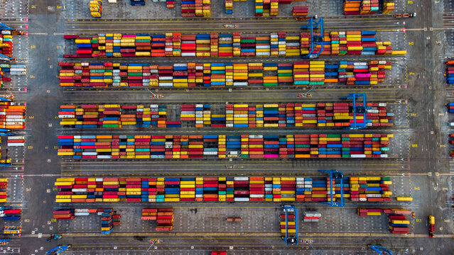 Aerial view of MPS Terminal 3 Import at the port of Accra, featuring rows of colorful shipping containers arranged in a grid pattern with industrial cranes in Accra, Greater Accra, Ghana.