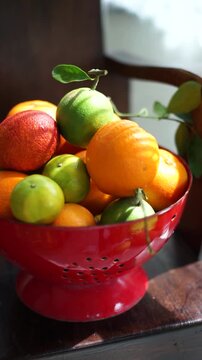 Fresh Assorted Fruits in a Basket with Lemons, Apples, Starfruit and More in HD