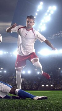 Two Soccer Players Challenging for the Ball