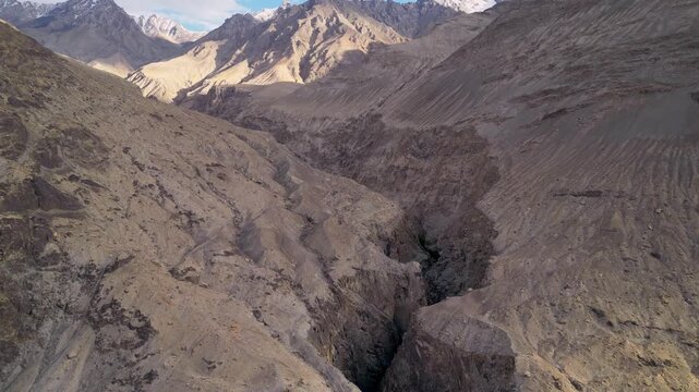 Aerial view of the rugged mountain landscape and deep valley near Diskit, Ladakh, INDIA.