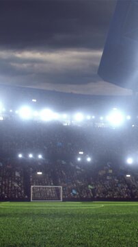 Empty Soccer Stadium with Goal Under Cloudy Sky